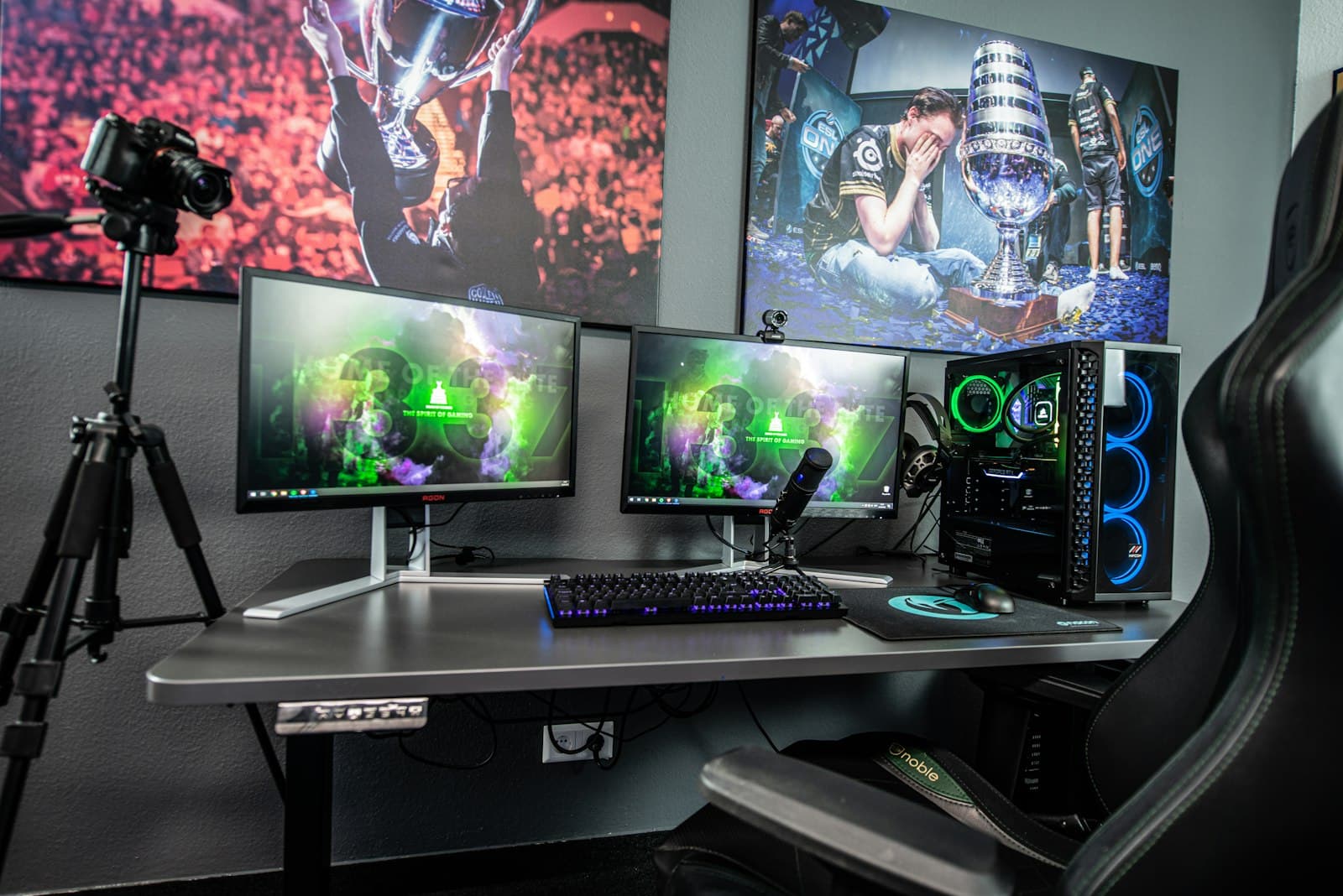 A creator's desk with camera, lights and monitors